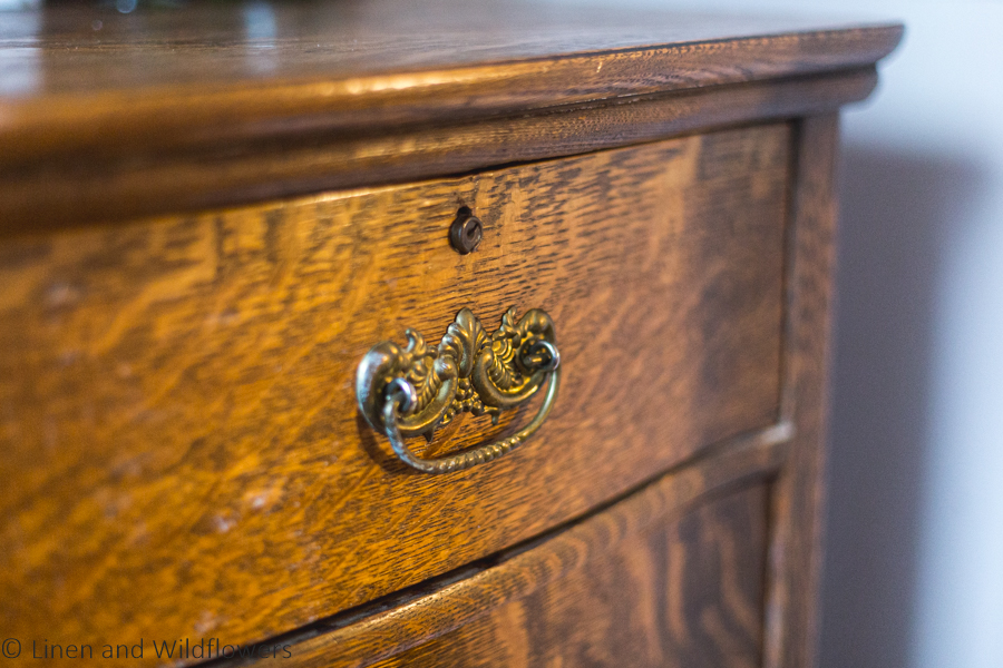 The original hardware of a tier wood Victorian Dresser