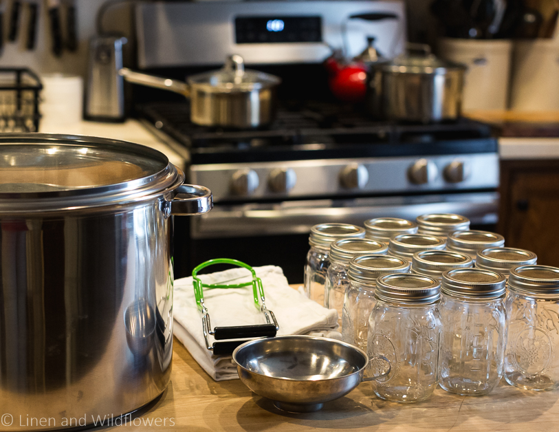 Simple Water bath Canning-Canning Supplies on butcher block