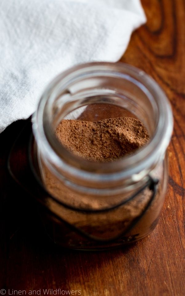 An antique ball mason jar with mocha mix in it.