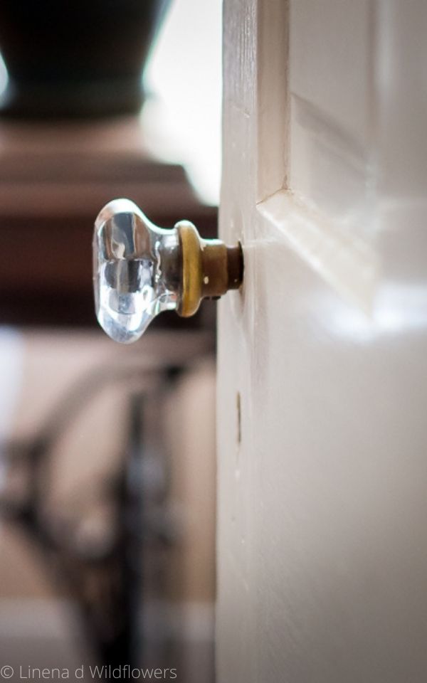Vintage glass door knob on door