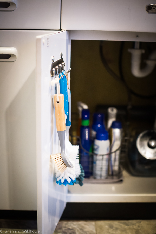 How to Organize Under a kitchen sink? using tips on how to organize cleaners & organization tools.