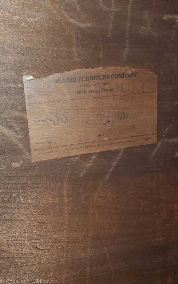 Reaser Furniture Company Label on the back of an Antique China cabinet.