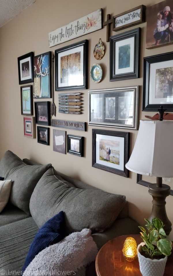 The Art of Styling Your Home-A wall gallery of art & family photos.