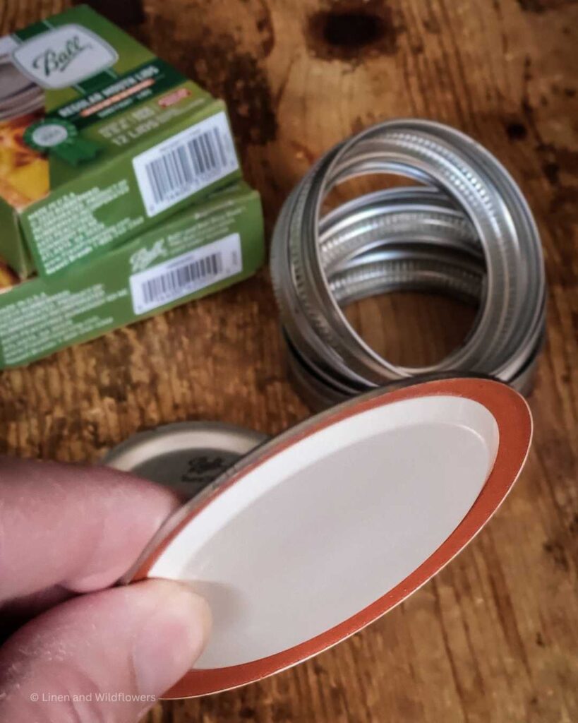 Ball Canning Lids Replacements, Holding a used canning lid & Canning Jar Rings.