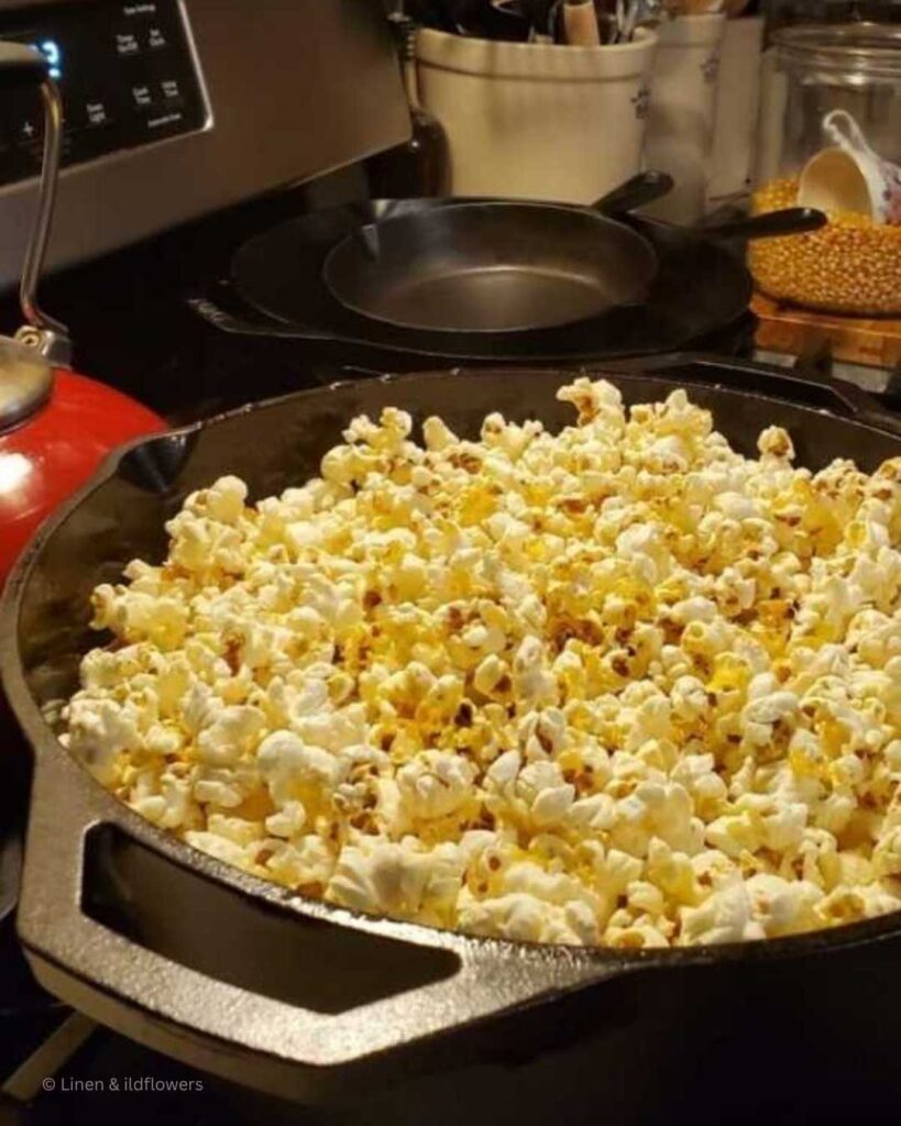 Dutch oven popcorn freshly popped on the stove.