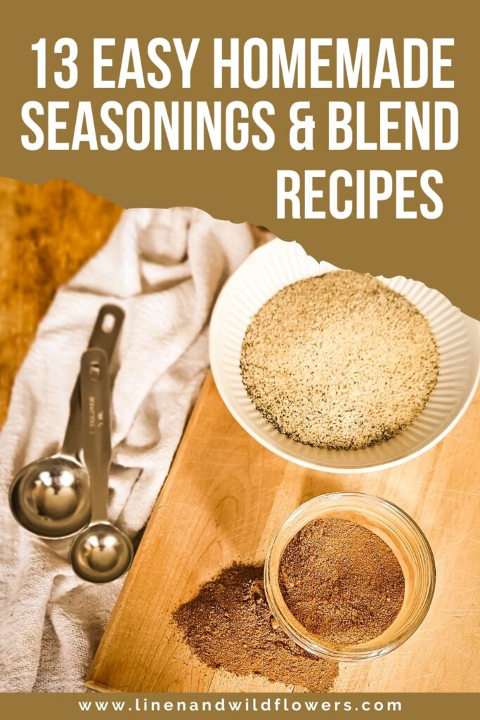 Two bowls with spices on a wooden board, a white cloth, and metal measuring spoons. Text: "13 Easy Homemade Seasonings & Blend Recipes."