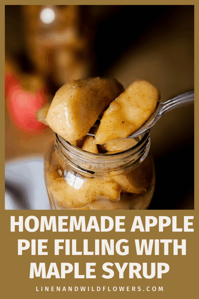 Jar of homemade apple pie filling with syrup glistens in warm light; apple slices on a spoon evoke comfort. Text reads: "Easy Homemade Apple Pie Filling Recipe."
