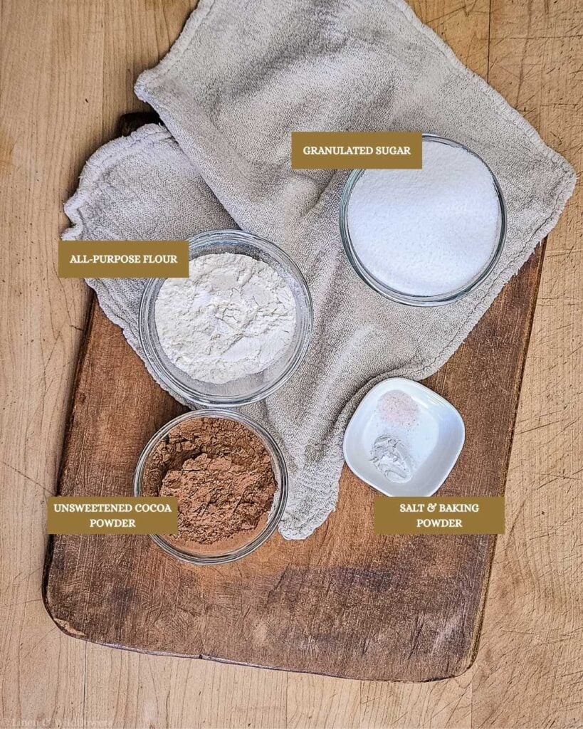 Ingredients in bowls, labeled for the homemade brownie mix recipe.