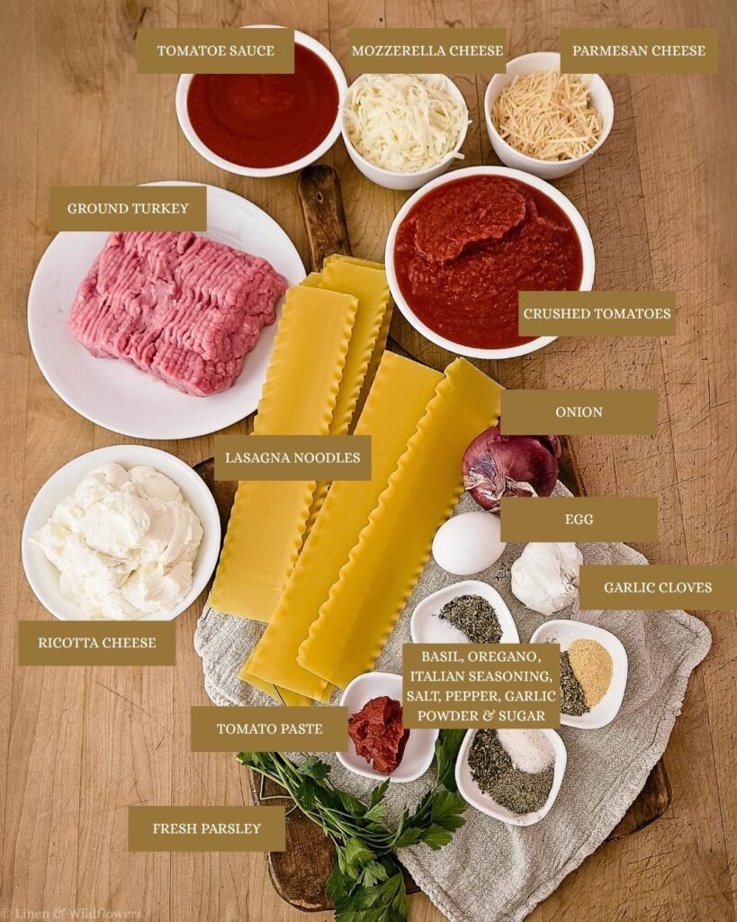 Labeled ingredients for homemade turkey lasagna including ground turkey, ricotta, crushed tomatoes, and lasagna noodles.
