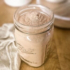 Homemade chocolate cake mix recipe stored in a Ball wide mouth mason jar.