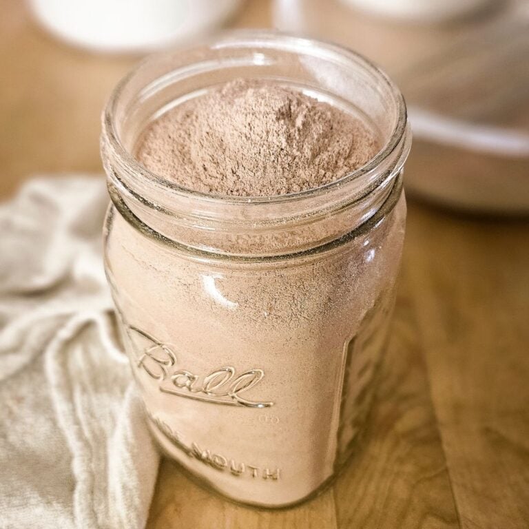 Homemade chocolate cake mix recipe stored in a Ball wide mouth mason jar.